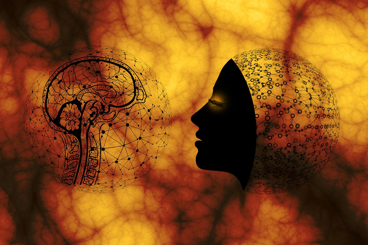 Graphics of a brain and face against a yellow cell background.